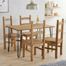 A 4 place dining set in pine wood,in a typical kitchen setting.