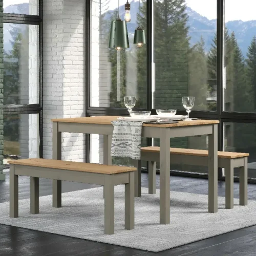 Large dining set with table and 2 benches, grey and pine. Placed in a corner with large windows at each elevation.
