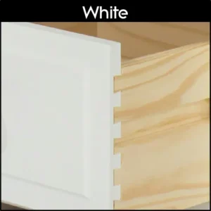 An open furniture drawer with a white front and a dovetailed joint, close up.