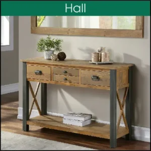 A reclaimed console table, with steel highlights, sitting in a hall, under a matching wall mirror.