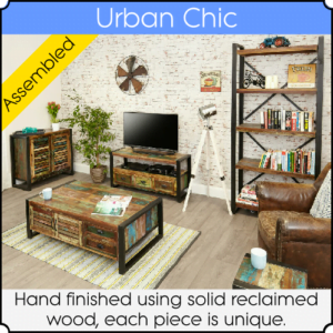 A living room with items of Urban Chic furniture. There's a coffee table, a sideboard, a TV unit and a tall bookcase, all made from reclaimed wood.
