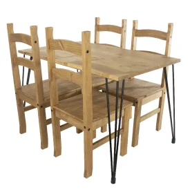 A large pine dining table, that has black metal hair pin style legs, with 4 matching chairs placed to the sides.