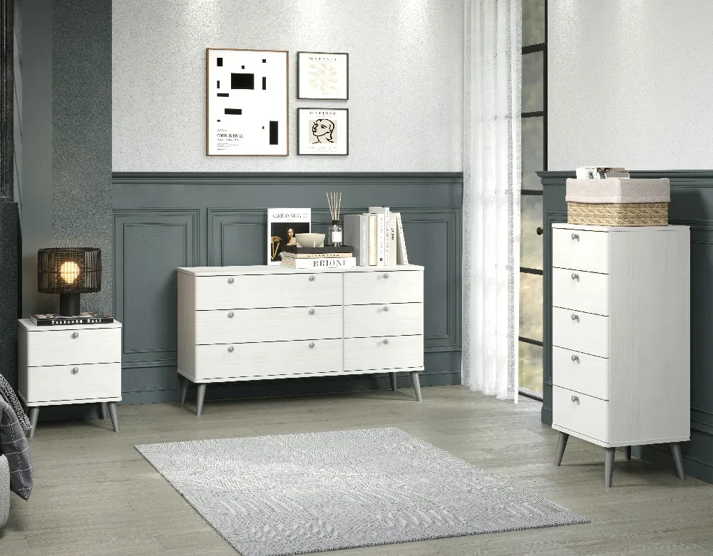 August Curve whitewashed bedroom furniture in a staged setting.