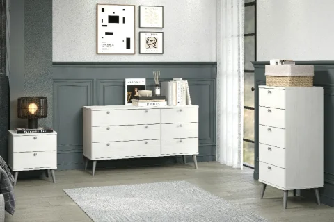 August Curve whitewashed bedroom furniture in a staged setting.